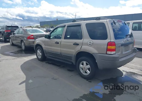 2001 Ford Escape Xlt from USA, damaged, VIN 1FMYU03181KA73971